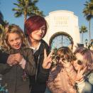 <p>Sharon served major cool-grandma vibes when she took Andy and Pearl to Universal Studios in Hollywood with daughter Kelly, <a href="https://www.instagram.com/p/BrWbKTEFGk9/" rel="nofollow noopener" target="_blank" data-ylk="slk:throwing up a peace sign;elm:context_link;itc:0;sec:content-canvas" class="link ">throwing up a peace sign</a> alongside her family. </p>