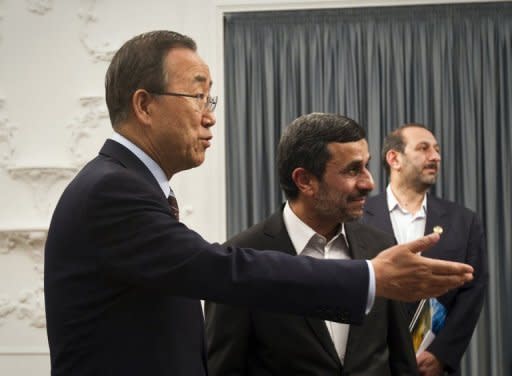 Iranian President Mahmoud Ahmadinejad (C) welcomes UN Secretary General Ban Ki-Moon (L) at the Iranian presidential office in Tehran. Ban and Iran's supreme leader, Ayatollah Ali Khamenei, sparred in an unusually frank verbal duel on Wednesday over Tehran's disputed nuclear programme, betraying high tensions on the issue