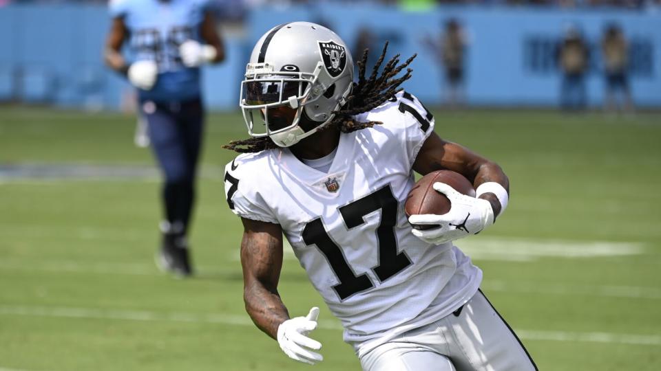 Las Vegas Raiders wide receiver Davante Adams plays against the Tennessee Titans.