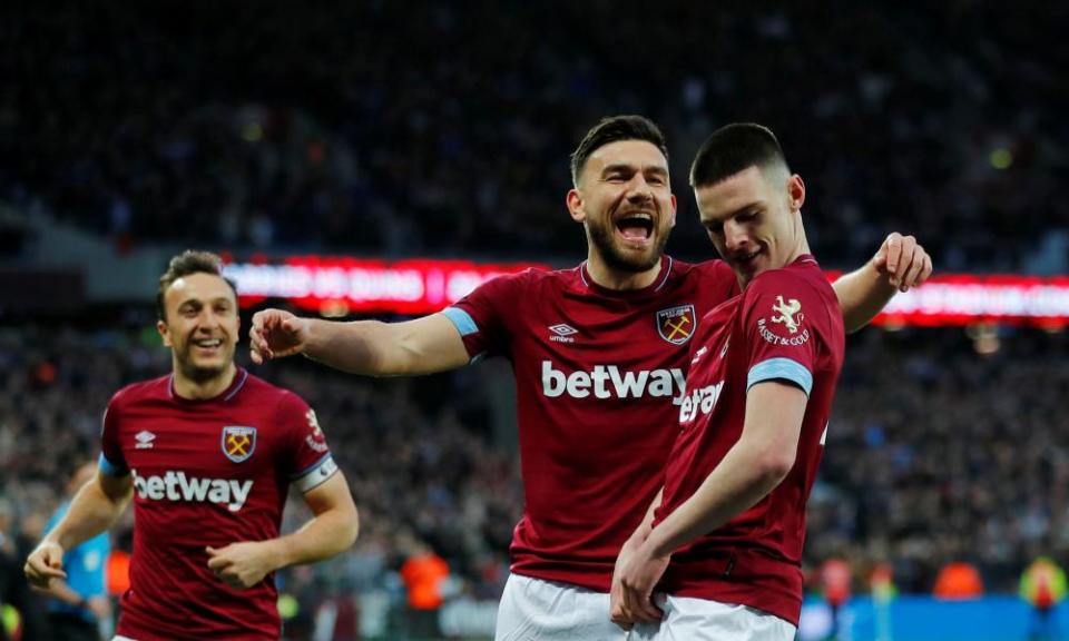 Declan Rice celebrates scoring West Ham’s first goal against Newcastle United in March with Robert Snodgrass and Mark Noble (left).