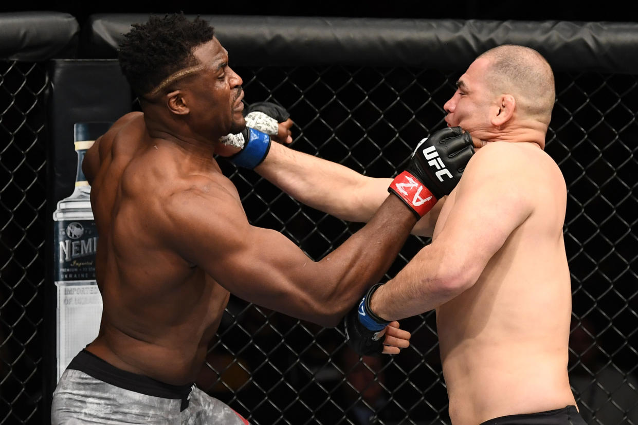 Francis Ngannou and Cain Velasquez exchange punches during UFC Fight Night at Talking Stick Resort Arena on Feb. 17, 2019 in Phoenix, Arizona. (Getty Images)