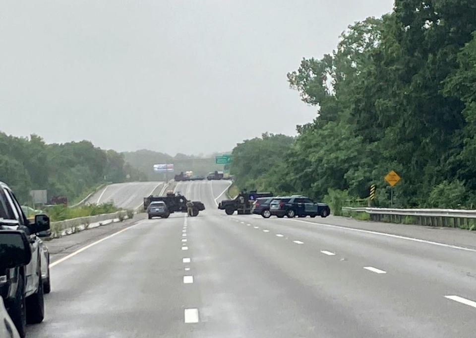 This photo provided by Massachusetts State Police shows police blocking off a section of Interstate 95 near Wakefield, Mass., on Saturday, July 3, 2021.