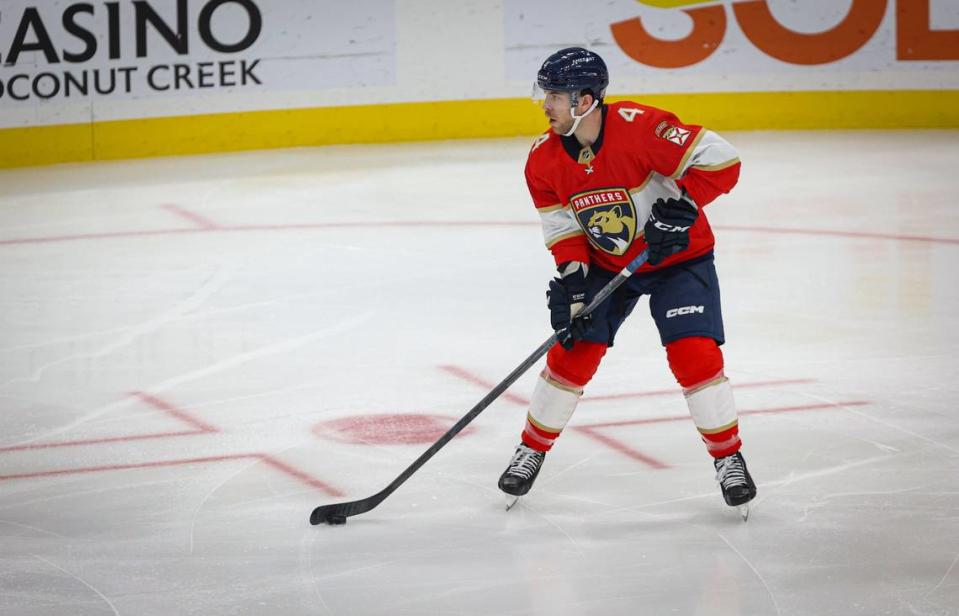 Florida Panthers defenseman Casey Fitzgerald (4) looks for an open teammate during the third period of a NHL game between the Florida Panthers and the Nashville Predators on Thursday, March 2, 2023, at FLA Live Arena in Sunrise, Fla. The Predators won 2-1.