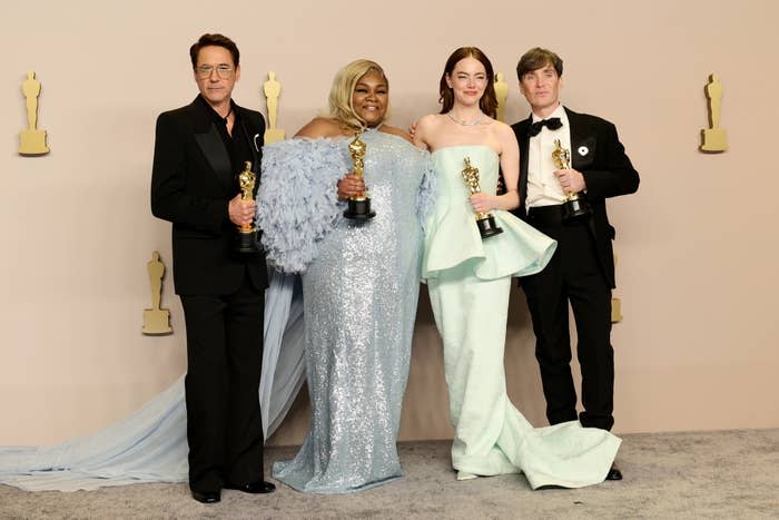 Robert Downey Jr., Da'Vine Joy Randolph, Emma Stone, and Cillian Murphy posing with their Oscars