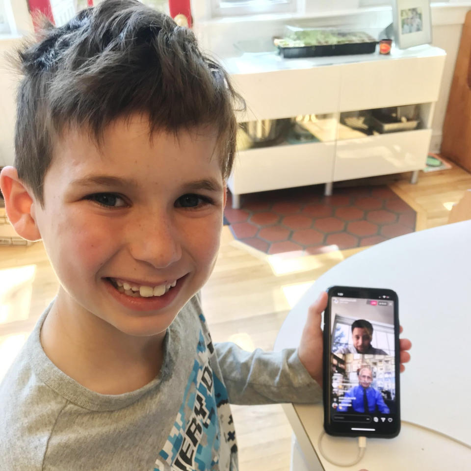 Gideon, the son of Maeve Kennedy McKean, as he watched Stephen Curry and Dr. Fauci on March 26, 2020.
 (Maeve Kennedy McKean / via Twitter)