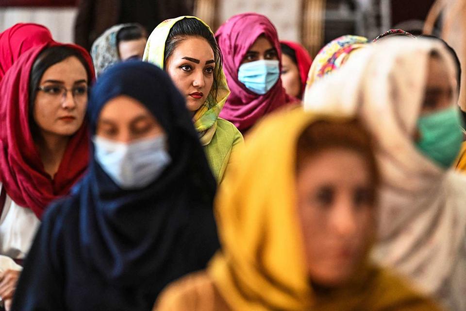 Afghan women take part in a gathering at a hall in Kabul on August 2, 2021 against the claimed human rights violations on women by the Taliban regime in Afghanistan.