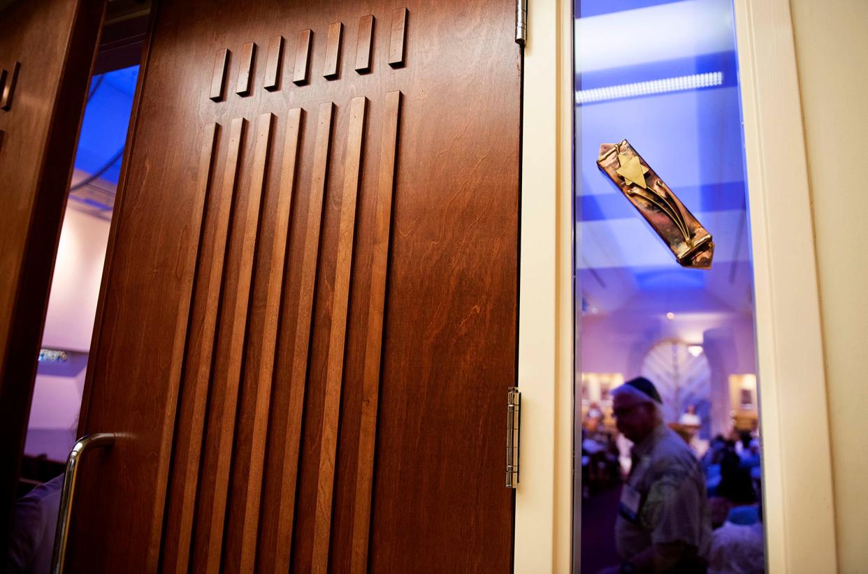 A mezuzah is attached to the entrance of the sanctuary as Rabbis Carlie Daniels and Ryan Daniels the co-senior rabbis of the congregation lead Shabbat services at Temple Israel August 18, 2023 in West Palm Beach.