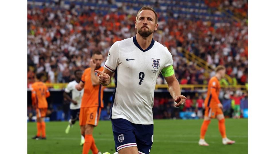 Harry Kane of England celebrates after he scores his team's opening goal from the penalty spot 