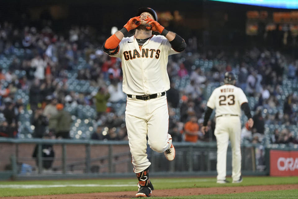 San Francisco Giants' Brandon Crawford gestures after hitting a two-run home run against the Arizona Diamondbacks during the fifth inning of a baseball game in San Francisco, Monday, June 14, 2021. (AP Photo/Jeff Chiu)