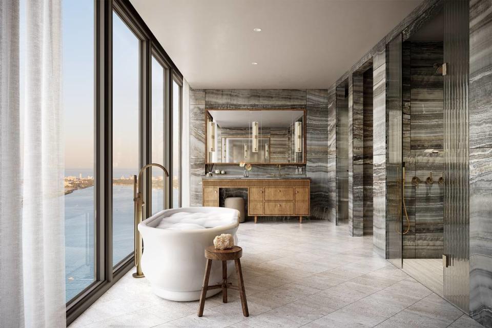 Una residencia de 3,000 pies cuadrados, la más pequeña del edificio, costará $4.5 millones. Arriba: Representación de un cuarto de baño en The Villa.