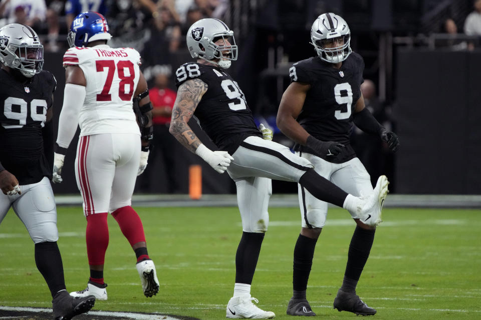 Las Vegas Raiders defensive end Maxx Crosby (98) reacts after a sack against the New York Giants during the first half of an NFL football game, Sunday, Nov. 5, 2023, in Las Vegas. (AP Photo/Rick Scuteri)