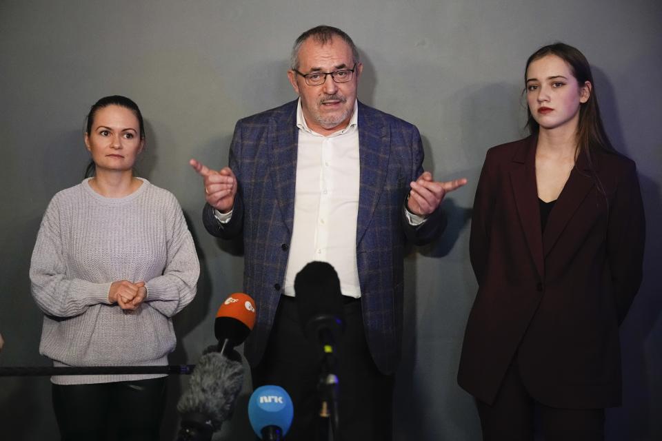 Boris Nadezhdin, a liberal Russian politician, center, who aspires to run for president in March's presidential election, stands with soldiers' wives, Maria Andreyeva, left, and Paulina, right, after a meeting with soldiers' wives in Moscow, Russia, Thursday, Jan. 11, 2024. A Russian presidential hopeful opposing Moscow's military action in Ukraine has met with a group of soldiers' wives who are demanding that their husbands be discharged from military service. (AP Photo/Alexander Zemlianichenko)