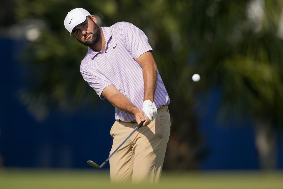 Scottie Scheffler chips to the green on the 17th hole during the second round of the RBC Heritage golf tournament, Friday, April 19, 2024, in Hilton Head Island, S.C. (AP Photo/Chris Carlson)