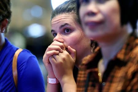 Supporters of U.S. Democratic presidential nominee Hillary Clinton react during the Nevada state democratic election night event in Las Vegas, Nevada, U.S. November 8, 2016. REUTERS/David Becker