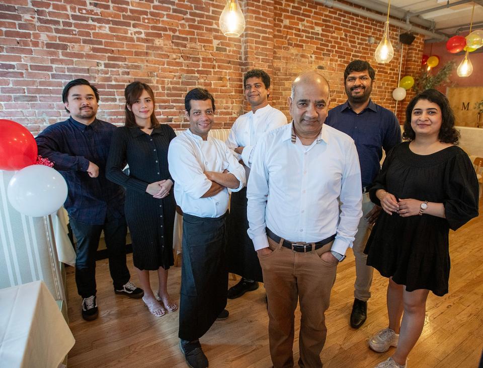 Dev Patel, center, and staff will be opening Bombay Lounge on Water Street Friday.