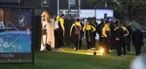 <p>Dortmund players stand outside the team hotel after the team bus was damaged in an explosion before the Champions League quarterfinal soccer match between Borussia Dortmund and AS Monaco in Dortmund, western Germany, Tuesday, April 11, 2017. (AP Photo/Martin Meissner) </p>