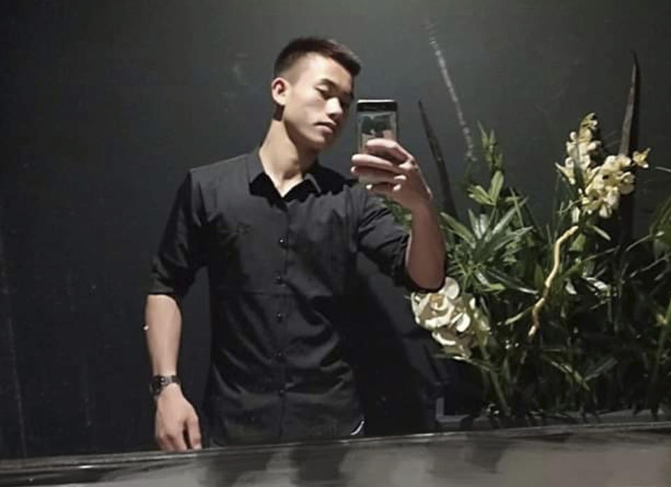 In a photo released by the family of Nguyen Dinh Luong shows Nguyen, 20, posing for a selfie in this undated photo. Luong's family fears that he may be among the 39 people found dead in the back of a container truck in southeastern England. (Family of Nguyen Dinh Luong via AP)