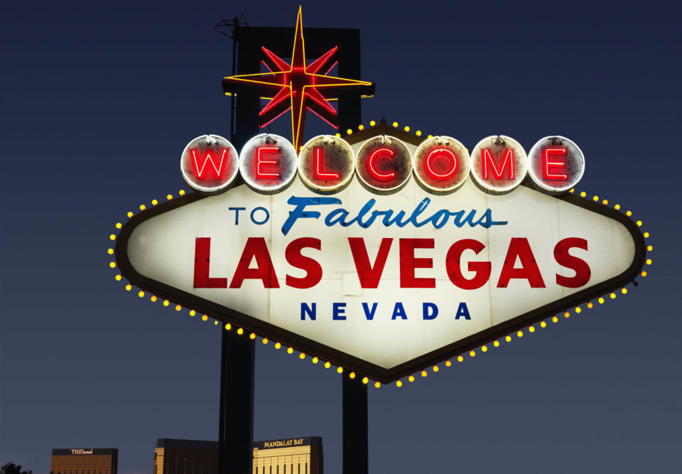 Lighted Las Vegas, Nevada welcome sign with night sky.