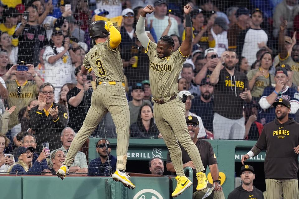 San Diego Padres' Jackson Merrill (3) celebrates after his three-run home run with Jurickson Profar, right, during the fifth inning of a baseball game against the Boston Red Sox, Friday, June 28. 2024, in Boston. (AP Photo/Michael Dwyer)