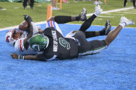 SMU wide receiver Rashee Rice (11) scores against Tulane cornerback Jaylon Monroe (9) during an NCAA college football game in New Orleans, Friday, Oct. 16, 2020. (AP Photo/Matthew Hinton)