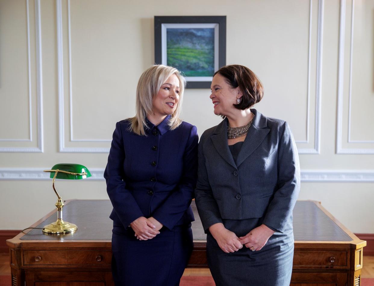 Michelle O’Neill, left, with Mary Lou McDonald in the First Minister’s office at Stormont (Liam McBurney/PA)