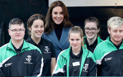 The Duchess of Cambridge with some of the scheme's graduates - Credit: Getty images