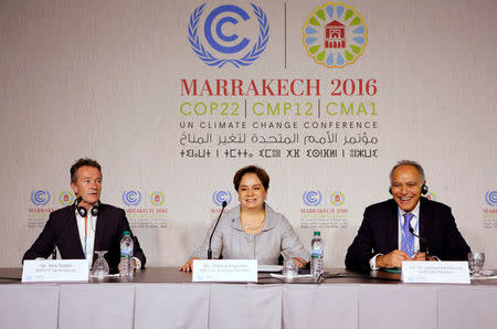 (L-R) UNFCCC Spokesperson Nick Nuttall, Executive Secretary of the UN Framework Convention on Climate Change Patricia Espinosa and Moroccan Foreign Minister and COP22 President Salaheddine Mezouar attend the World Climate Change Conference 2016 (COP22) in Marrakech, Morocco, November 6, 2016. REUTERS/Youssef Boudlal