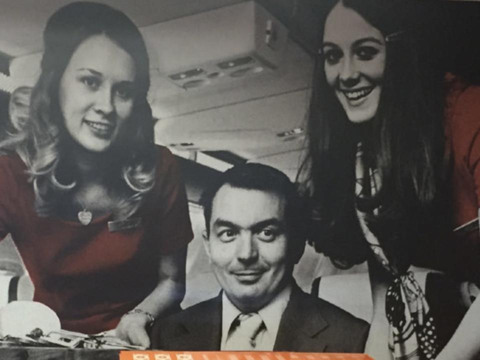 Early flight attendants with customers