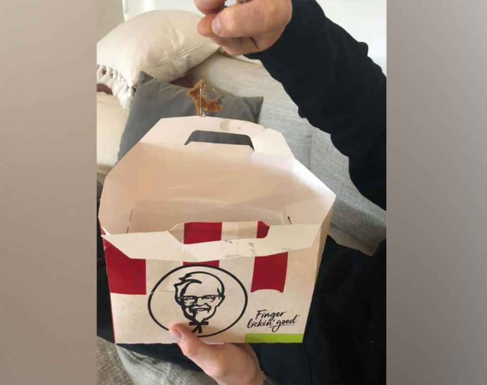 A man has tucked into a box of KFC from a Cranbourne restaurant to find a safety pin and hair in his chicken lunch meal. Source: Jamie Allen / Facebook