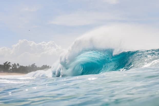 Sitting in the channel, I love photographing empty waves at Pipeline. With a bit of north in the swell, there was lots of backwash from the sand still left on the reef.<p>Ryan "Chachi" Craig</p>