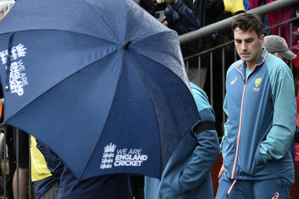 Australia's Pat Cummins leaves after the match was abandoned due to rain on the fifth day of the fourth Ashes Test match between England and Australia at Old Trafford, Manchester, England, Sunday, July 23, 2023. (AP Photo/Rui Vieira)