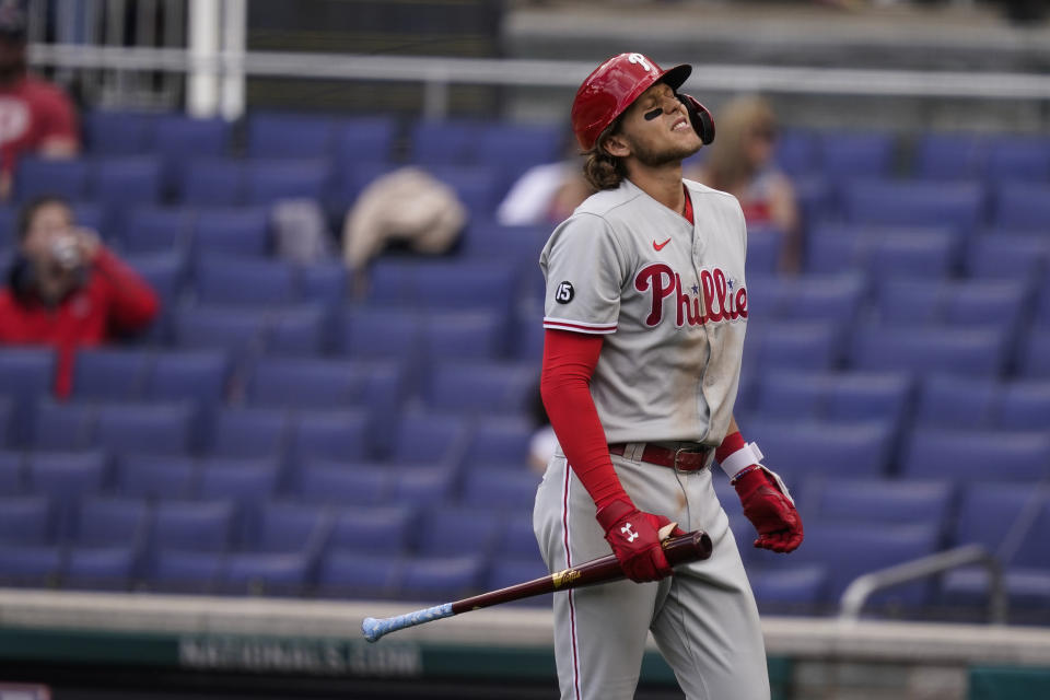 Philadelphia Phillies' Alec Bohm reacts after striking out during the ninth inning of a baseball game against the Washington Nationals at Nationals Park, Thursday, May 13, 2021, in Washington. The Nationals won 5-1. (AP Photo/Alex Brandon)