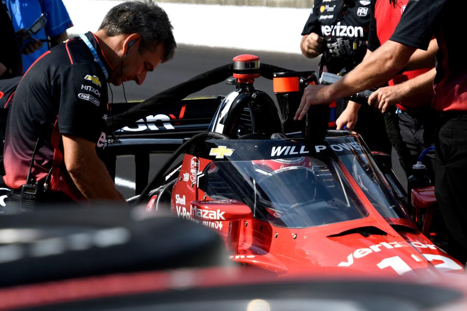 Team Penske driver Will Power (12) sits in his car Friday, July 29, 2022, during practice for the Gallagher Grand Prix at Indianapolis Motor Speedway.