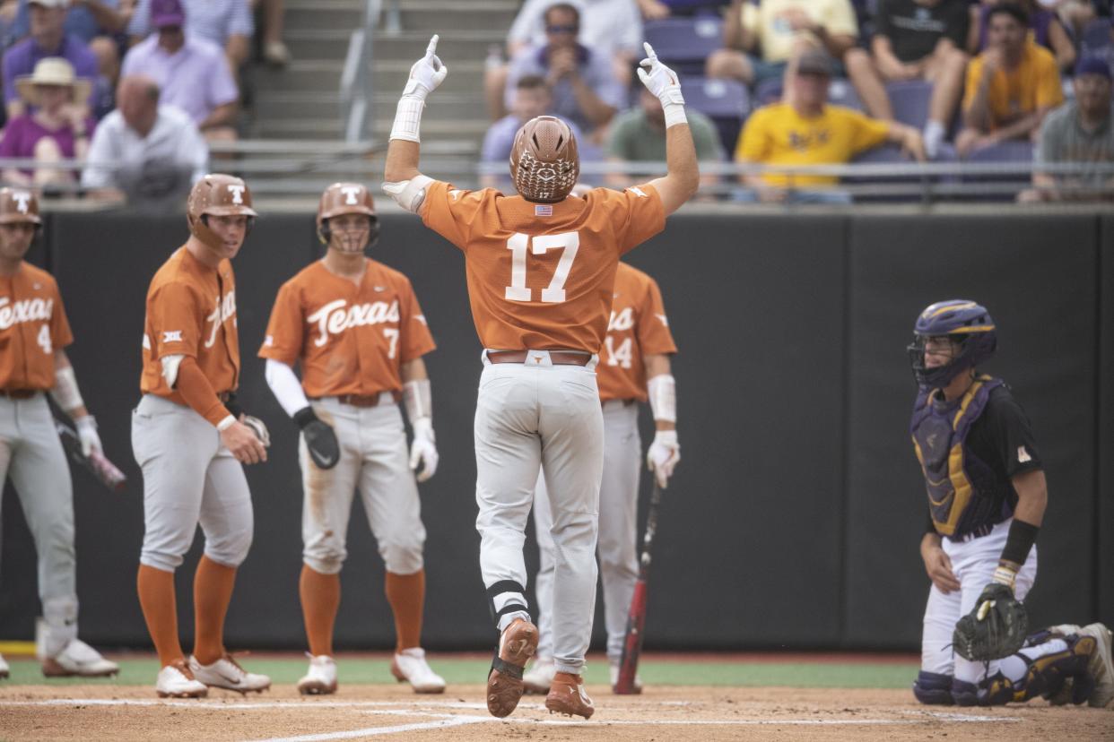 Texas' Ivan Melendez gestures toward the sky as he reaches the plate after hitting a three-run homer in the NCAA super regionals against East Carolina. Melendez's No. 17 jersey might someday be retired by UT, which has retired only five baseball numbers in school history.