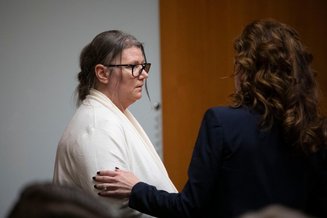 Jennifer Crumbley, left, sits with her attorney, Shannon Smith, on Feb. 6 in Oakland County Circuit Court immediately before the jury found her guilty on four counts of involuntary manslaughter.