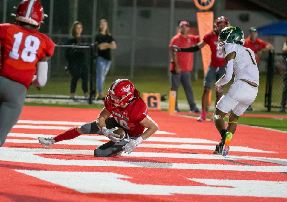 Bradford's Chason Clark dives for a catch in the end zone against Lecanto. The Tornadoes welcome rival Baker County to Starke in Friday's district final.