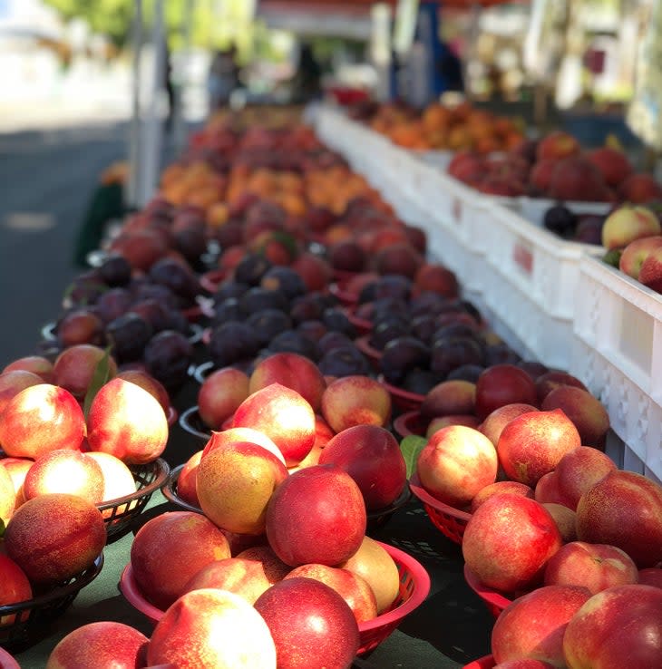 Fresh peaches and plums at a Modesto farm stand