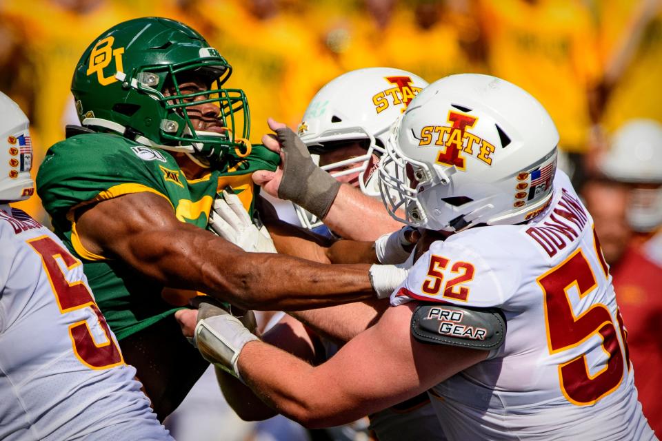 Trevor Downing (52) is perhaps Iowa State's most important offensive lineman, leading a group that has often lagged behind the rest of the offense.