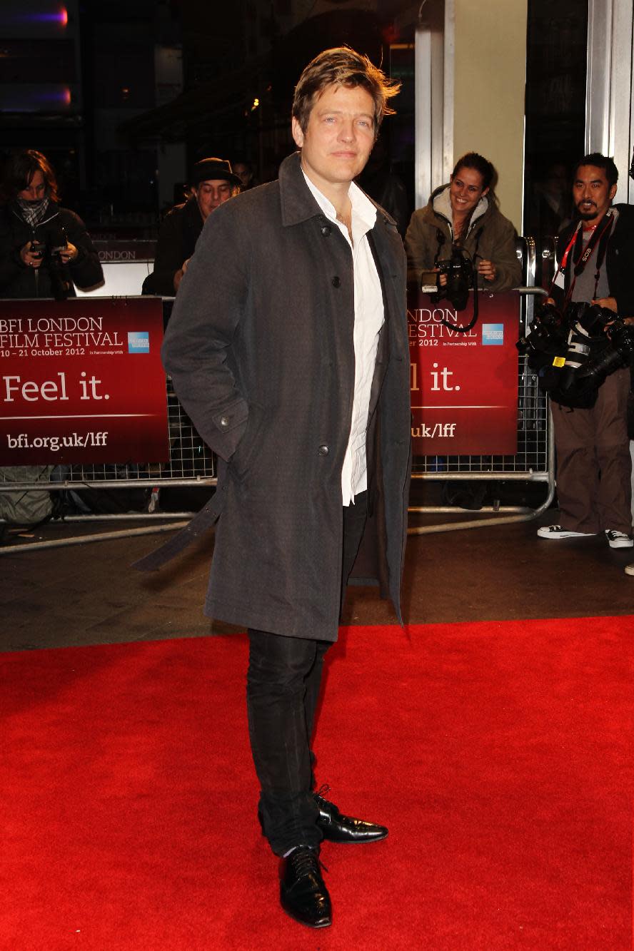 FILE - In this Oct. 13, 2012 file photo, Thomas Vinterberg arrives at a screening for "The Hunt" during the London Film Festival at The Odeon, Leicester Square, in London. Four of the five directors of Golden Globe-nominated foreign-language films, Paolo Sorrentino, "A Great Beauty," Abdellatif Kechiche, "Blue Is the Warmest Color," Vinterberg, "The Hunt," and Asghar Farhadi, "The Past," gather in Hollywood for a panel symposium on their films nominated for Best Foreign Language Film at The Egyptian Theatre on Saturday, Jan. 11, 2014. Hayao Miyazaki, whose film, "The Wind Rises" is also nominated in the same category, is unable to attend. (Photo by Miles Willis/Invision/AP, File)