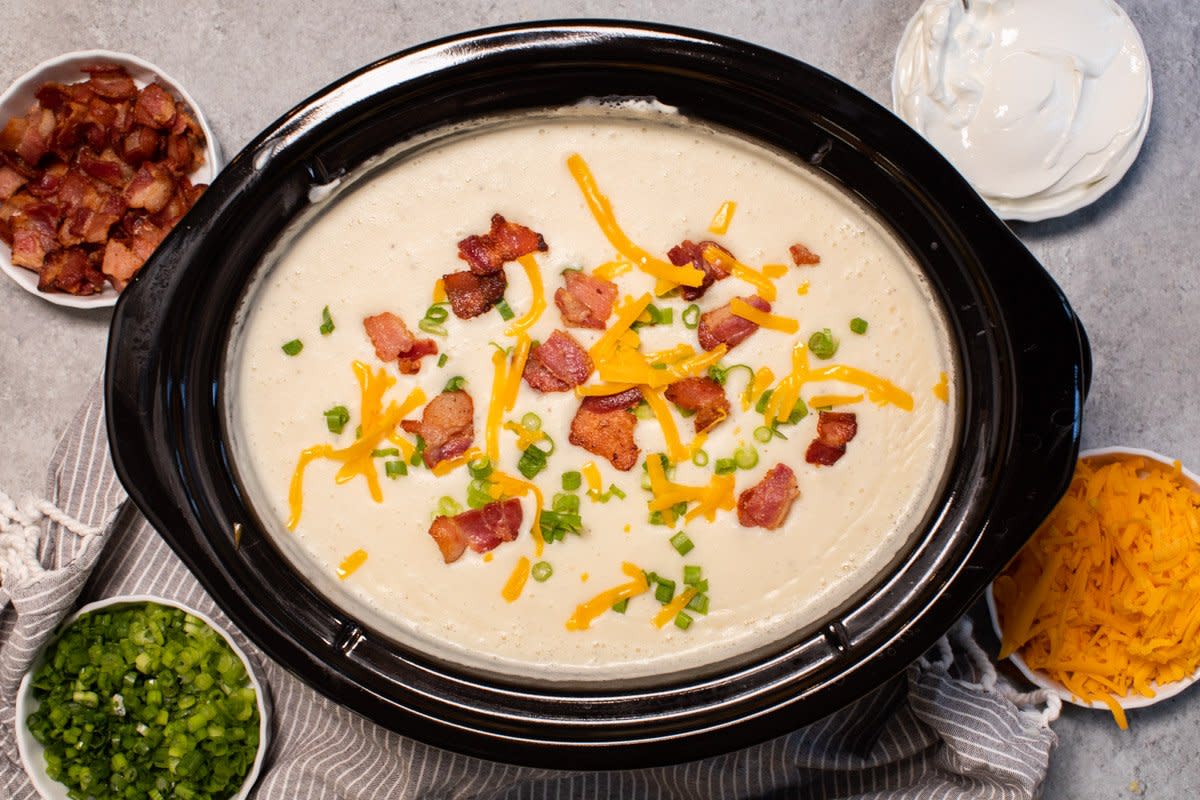<p>The Magical Slow Cooker</p><p>Everything you love about a loaded baked potato in soup form!</p><p><strong>Get the Recipe:</strong><a href="https://www.themagicalslowcooker.com/baked-potato-soup/" rel="nofollow noopener" target="_blank" data-ylk="slk:Crock Pot Baked Potato Soup;elm:context_link;itc:0;sec:content-canvas" class="link rapid-noclick-resp">Crock Pot Baked Potato Soup</a></p>