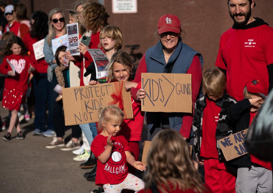 Participants representing the Walnut Grove Elementary School in Franklin, Tenn., take part in the "Linking Arms for Change" event along West End Avenue to commemorate The Covenant School shooting's one-year anniversary in Nashville, Tenn., Wednesday, March 27, 2024.