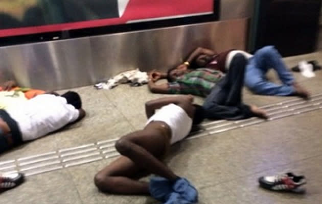 A photo showing allegedly “naked and drunk foreign workers” at Bugis MRT station has gained buzz after it was shared on local blog The Real Singapore on Thursday. (Photo by Tamila Boyz/The Real Singapore)