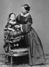 <p>Queen Victoria (1819-1901) had nine children during her reign, which began in 1837. Her first child, also Victoria, was born in 1840, and her youngest, Beatrice (pictured here with her mother) was born 17 years later in 1857. (Photo: Hulton Archive/Getty Images) </p>