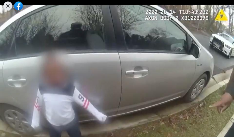 The 5-year-old boy is seen being confronted by one of the two officers after he allegedly walked away from school. (Photo: Montgomery County Police Department)