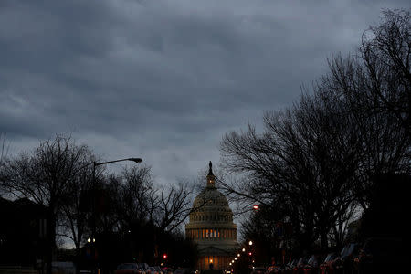 The U.S. Capitol is lit during the second day of a shutdown of the federal government in Washington, U.S., January 21, 2018. REUTERS/Joshua Roberts