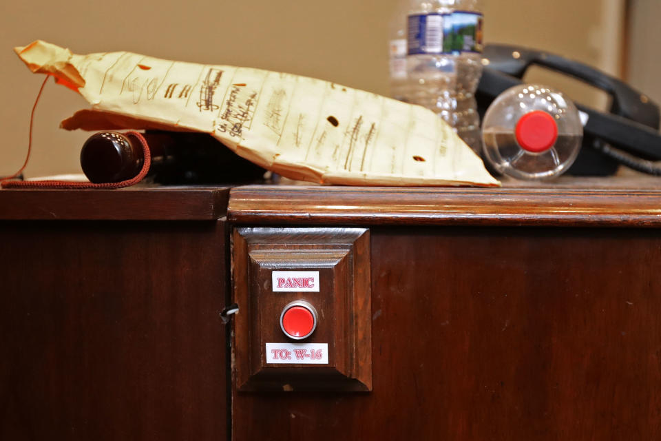 A piece of furniture with an attached panic&nbsp;button sits in the Roosevelt Room during renovation work.