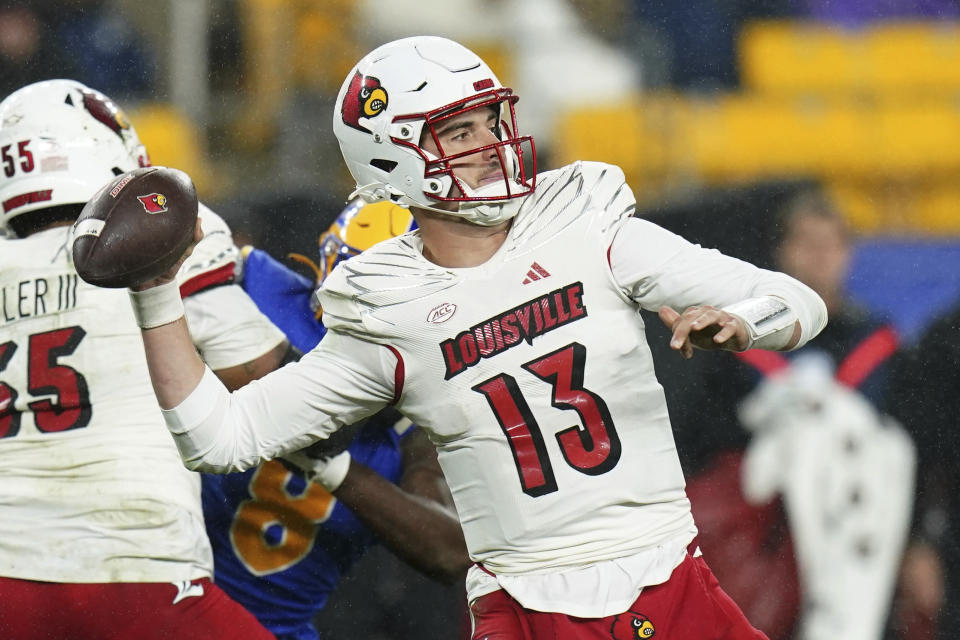 Louisville quarterback Jack Plummer prepares to throw a pass against Pittsburgh during the first half of an NCAA college football game in Pittsburgh, Saturday, Oct. 14, 2023. (AP Photo/Matt Freed)