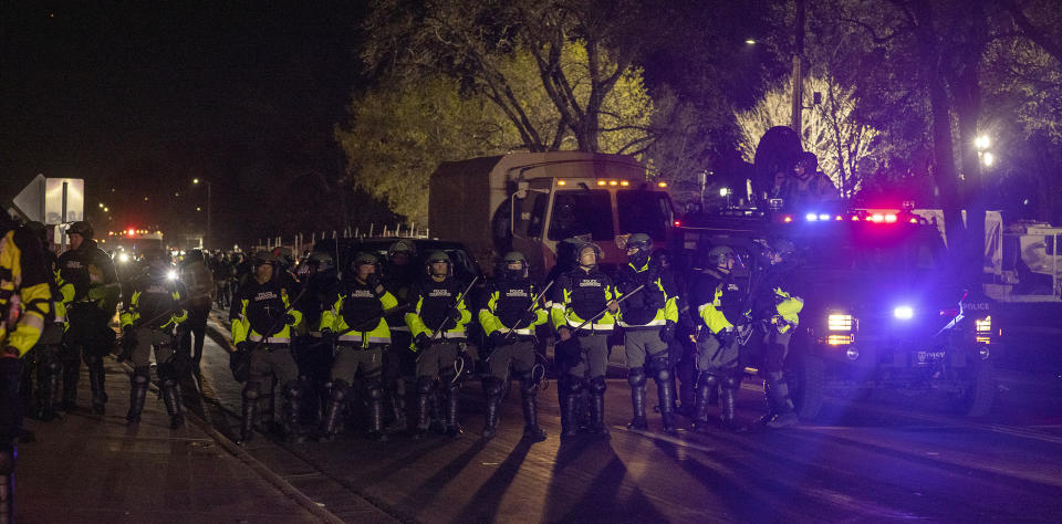 Protestors gather in front of the Brooklyn Center Police Department during a protest in the shooting of Daunte Wright, Friday, April 16, 2021 in Brooklyn Center, Minn. Former Brooklyn Center police Officer Kim Potter was charged with second-degree manslaughter in Sunday's shooting of Wright, a 20-year-old Black man, during a traffic stop. (Elizabeth Flores/Star Tribune via AP)