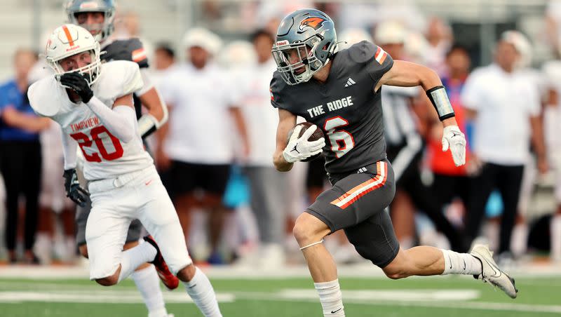 Skyridge’s Trevan McClellan gets into the secondary for a big gain against Timpview at Skyridge in Lehi on Friday, Aug. 11, 2023. Skyridge won 26-14.