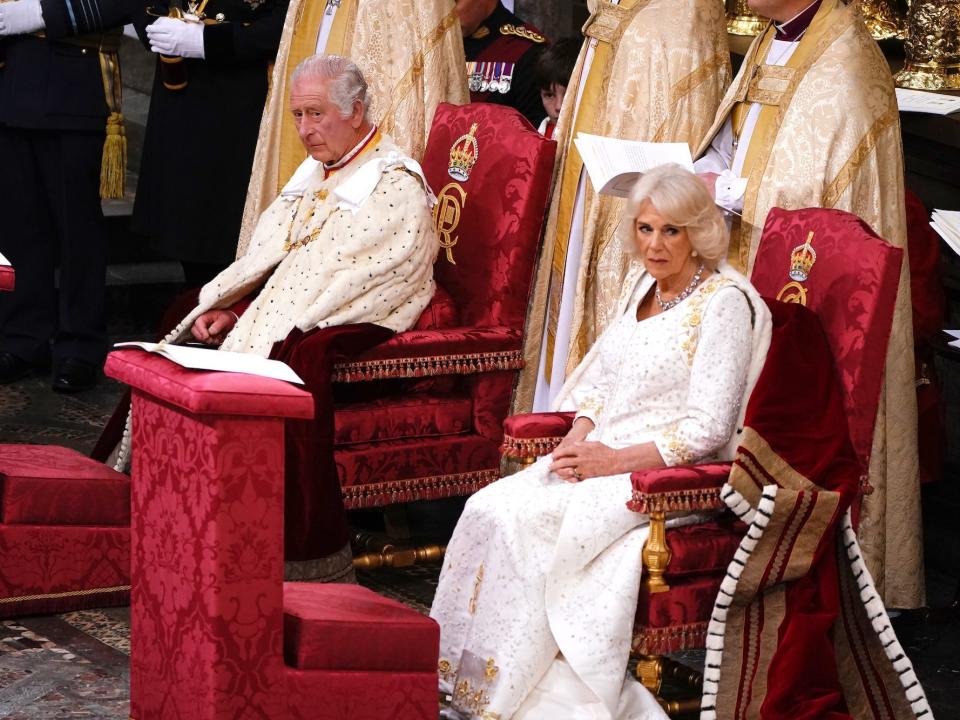 King Charles and Queen Camilla on their thrones at the coronation on May 6, 2023.